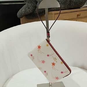 Coach Cream Wristlet with Pink and Orange Star Motif